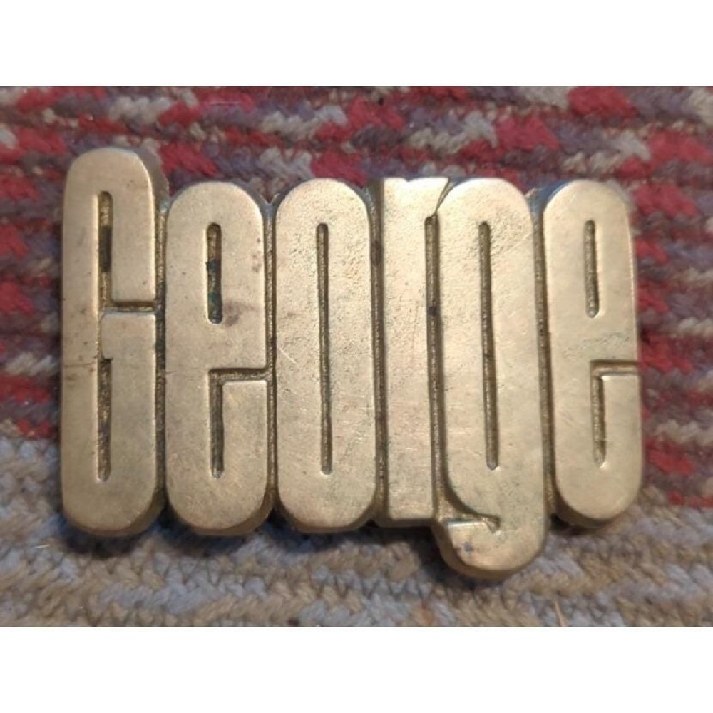 VINTAGE GEORGE BRASS BELT BUCKLE COLLECTIBLE